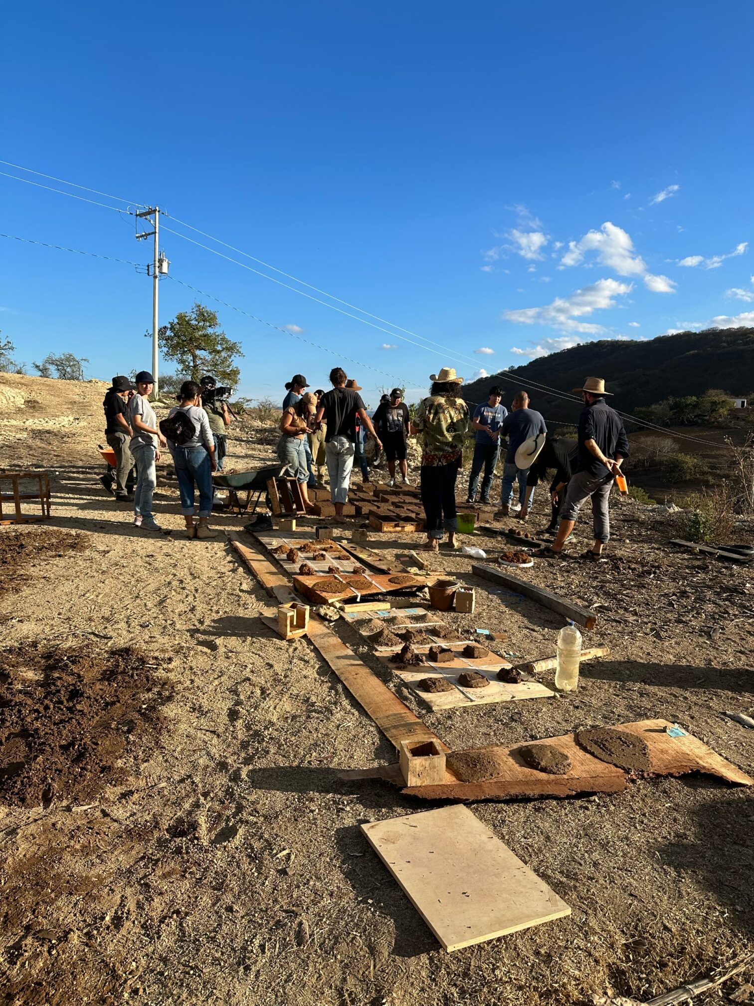 Image of people building kitchens and patios using mezcal by-products