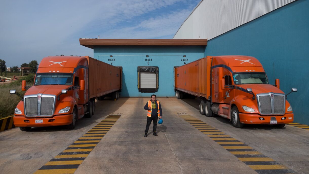 Image of trucks and a man