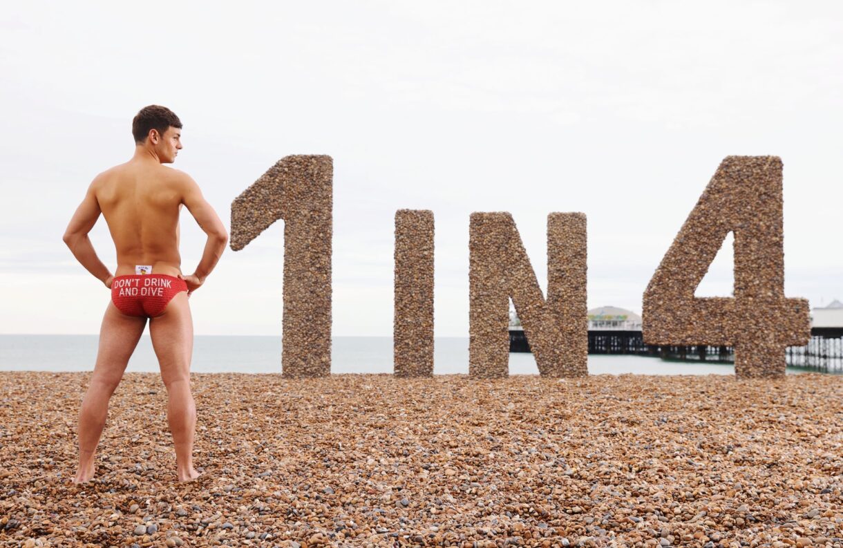 Tom Daley on the beach