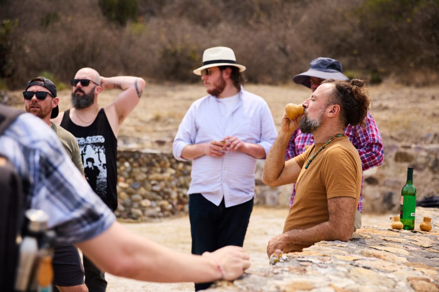 Image of people working on Del Maguey talking