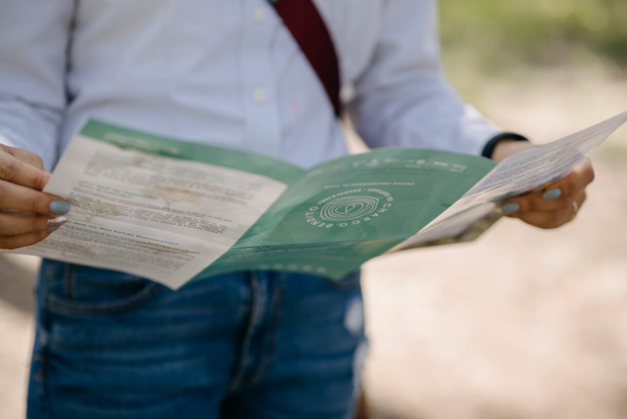 Man reading folder